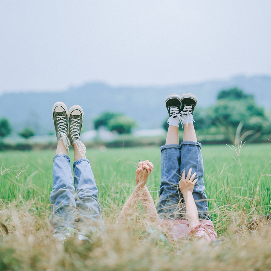 Feet in the air in field